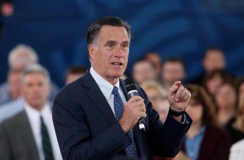 Former Republican U.S. presidential nominee Mitt Romney introduces current Republican presidential candidate John Kasich at a campaign rally in North Canton Ohio