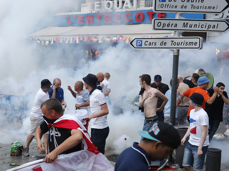 French police fired tear gas as scuffles break out between British and Russian soccer fans Friday