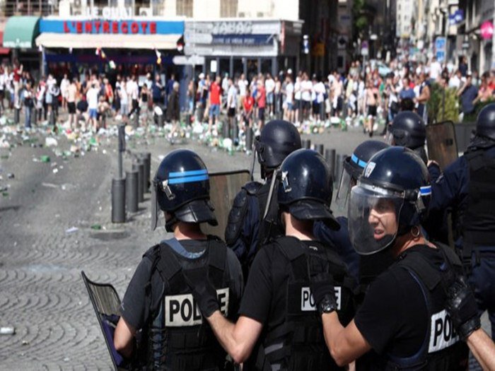 England fans appear to mock young 'begging' children by throwing coins at them in Lille