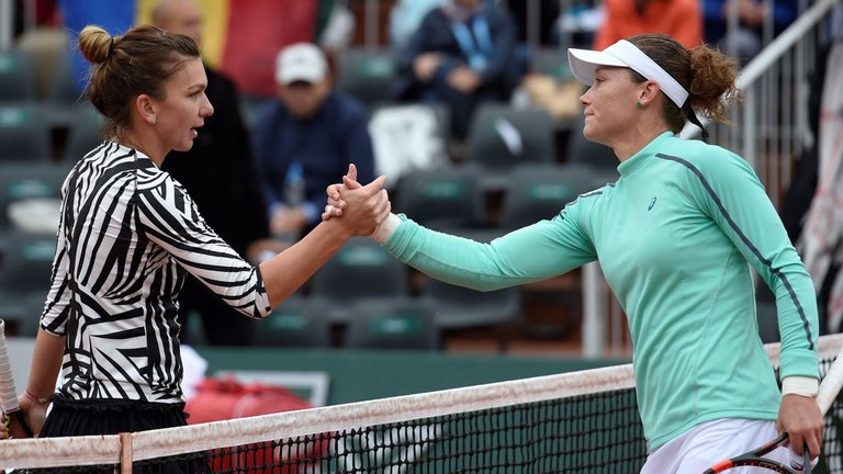 Sam Stosur saw off Simona Halep in their fourth-round match