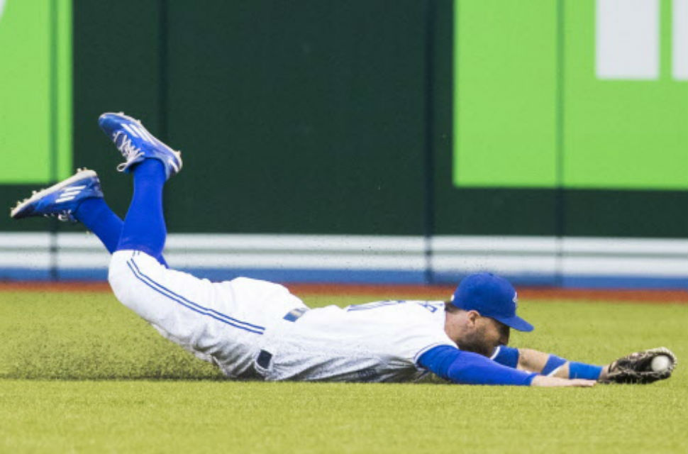 Toronto Blue Jays&#039 Kevin Pillar makes a diving catch against the New York Yankees in Toronto Tuesday. The Jays won 4-1