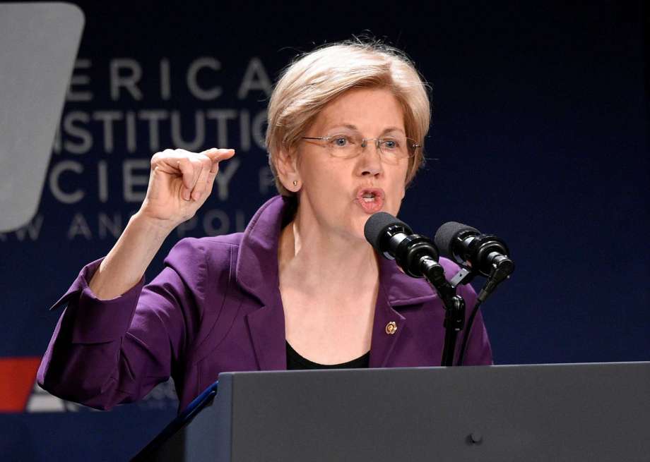 Sen. Elizabeth Warren D-Mass. speaks in Washington. Warren is relishing her role as attack dog against Donald Trump