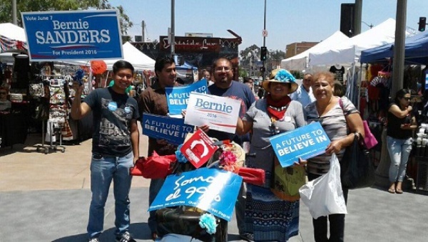 Bernie Sanders supporters trickled into the action which ended with about 20 supporters said Ramirez who is holding the white sign