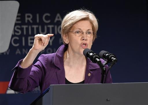 Sen. Elizabeth Warren D-Mass. speaks in Washington. Warren is relishing her role as attack dog against Donald Trump