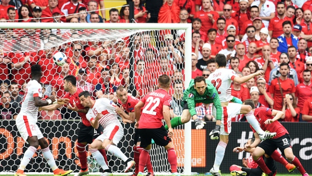 Switzerland's defender Fabian Schaer scores a header that stood as the only goal in Saturday's match against Albania