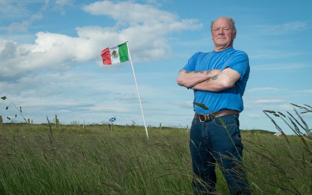 Scotsman Michael Forbes proudly flies the Mexican flag at his home north of Aberdeen next to Trump International Golf Links course