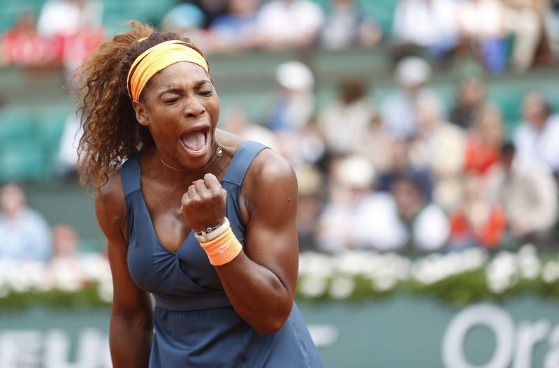 Serena Williams of the U.S. reacts during her women's singles match against Roberta Vinci of Italy at the French Open tennis tournament at