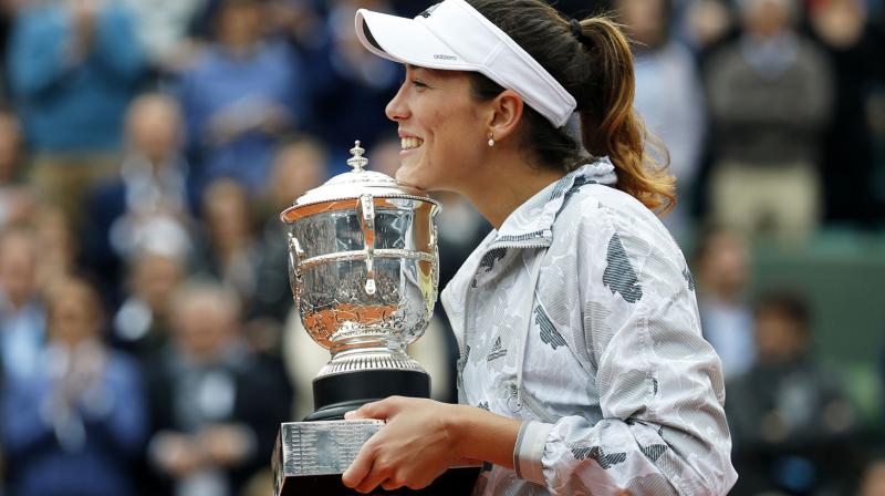 Muguruza has become the first Spanish woman to win a Grand Slam since Arantxa Sanchez Vicario in Paris in 1998