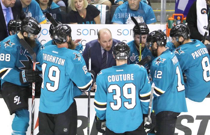 San Jose Sharks’ coach Peter De Boer talks with his team during a break in the third period against the Pittsburgh Penguins in Game 3 of the 2016 NHL Stanley Cup Final at SAP Center in San Jose California Saturday. — AFP