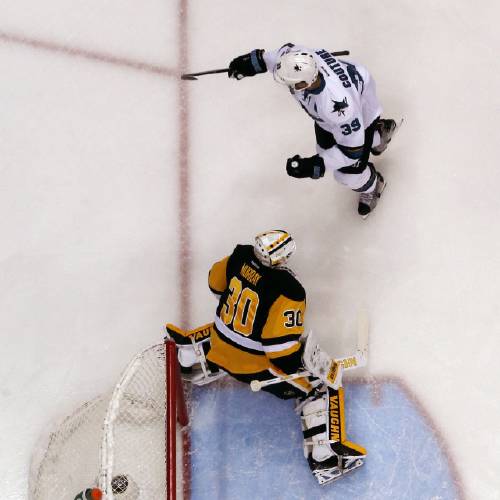 Sharks&#039 Logan Couture celebrates putting the puck behind Pittsburgh Penguins goalie Matt Murray for a goal during the first period of Game 5 of the NHL hockey Stanley Cup Final series Thursday