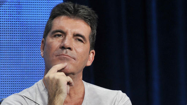 Simon Cowell attends the Fox Summer TCA press tour in Beverly Hills on Aug. 1 2013.         
                                     Chris Pizzello  AP