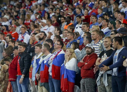 Russian fans watch the Euro 2016 Group B soccer match between Russia and Slovakia at the Pierre Mauroy stadium in Villeneuve d’Ascq near Lille France Wednesday