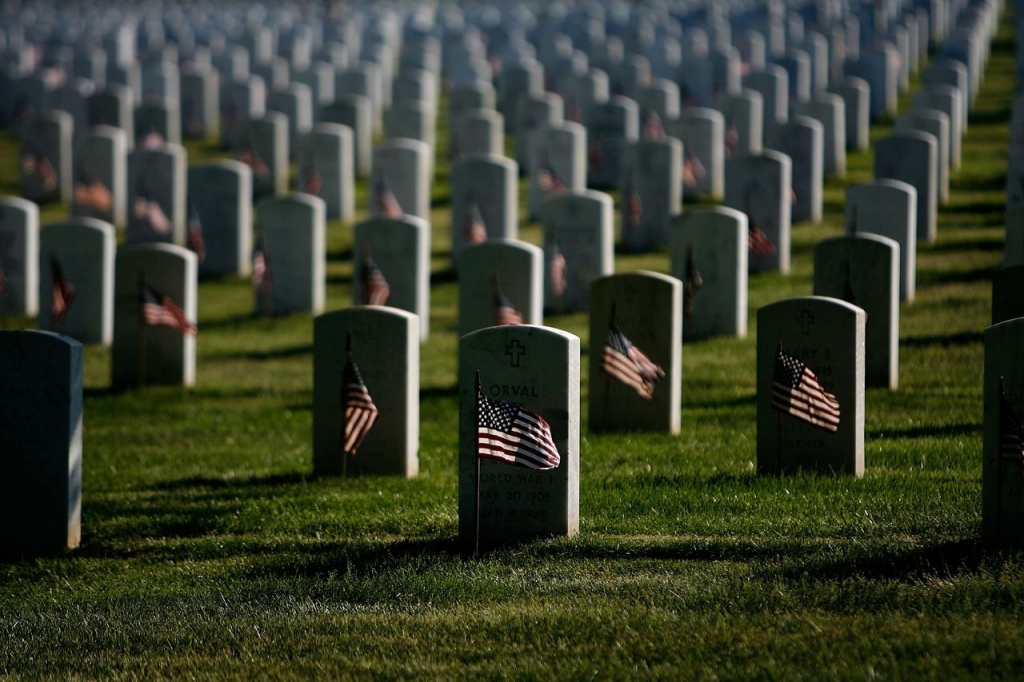 Small flags are placed in front of the graves at Arlington Cemetery for Memorial Day.     Chip Somodevilla via Getty Images