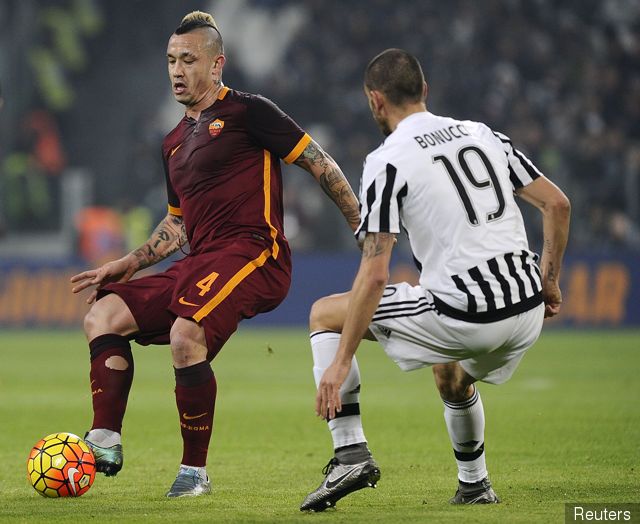 Juventus Leonardo Bonucci in action against AS Roma's Radja Nainggolan