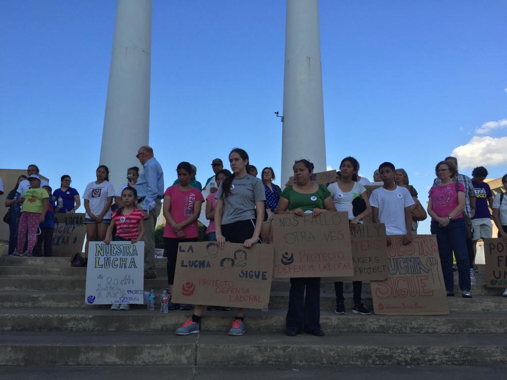 Protesters gathered yesterday outside Dallas City Hall after the U.S. Supreme Court announced its 4-4 decision on United States v. Texas