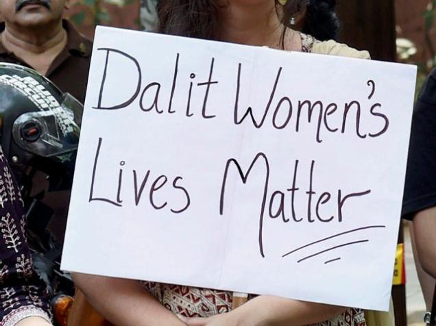 A placard held during a protest against the rape and murder of the Dalit law student outside Kerala Bhawan in New Delhi