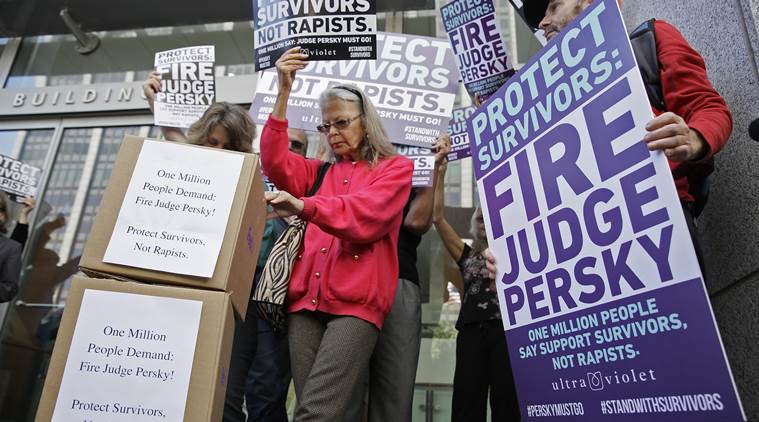 Activists from UltraViolet a national women's advocacy organization hold a rally before delivering over one million signatures to the California Commission on Judicial Performance calling for the removal of Judge Aaron Persky from the bench Friday June