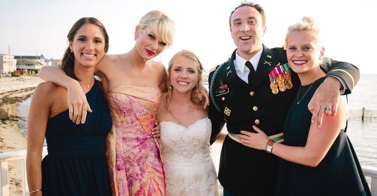 Taylor Swift with surprised guests at a California wedding