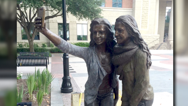 Texas city builds sculpture of two girls taking a selfie