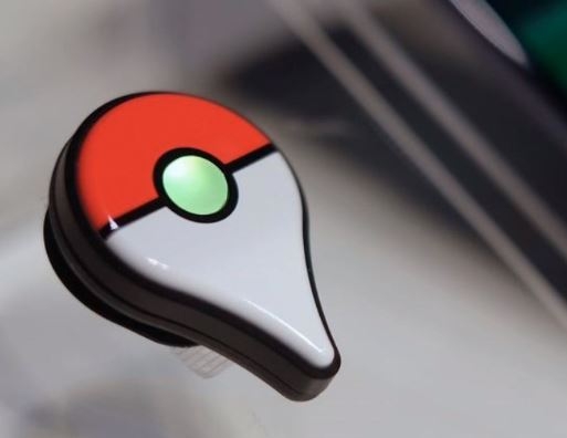 The Pokemon GO Plus companion device is displayed