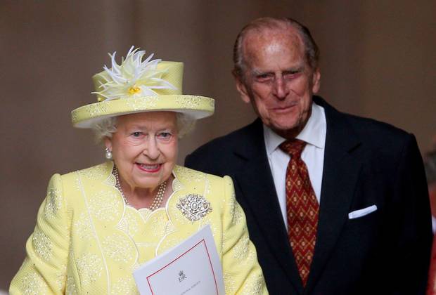 The Queen and The Duke of Edinburgh arrive at the service yesterday