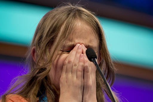 Sylvie Lamontagne 13 of Lakewood Colo. focuses to spell a word correctly during the finals of the 2016 National Spelling Bee in National Harbor Md. on Thursday