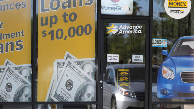 The storefront of an Advance America loan store is shown in Palm Springs California