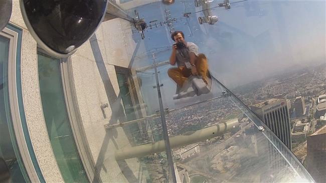 Those who want a thrill ride will be able to sit down and slide for 14 meters to an outdoor platform at the 69th floor