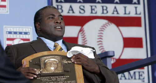 Former San Diego Padres outfielder Tony Gwynn holds his Hall of Fame plaque following his induction into the National Baseball Hall of Fame in Cooperstown New York