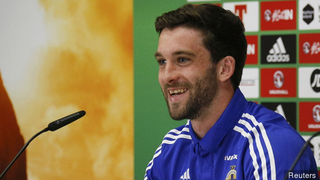 Northern Ireland's Will Grigg attends a news conference