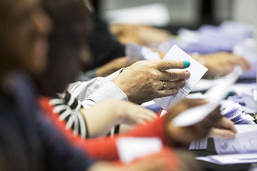 Ballots are counted at the Manchester Central Convention Complex in north west England