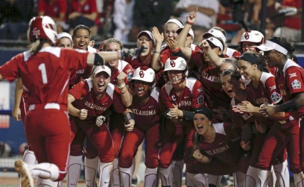 Oklahoma's Nicole Pendley left is greeted by teammates