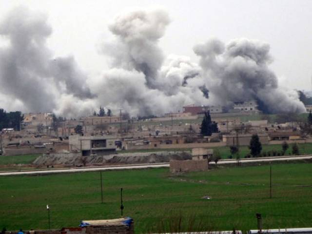 27 2016 in Akcakale in Sanliurfa province shows smoke rising from the neighbourhood of Syrian city Tel Abyad during clashes between Islamic State Group and People's Protection Units