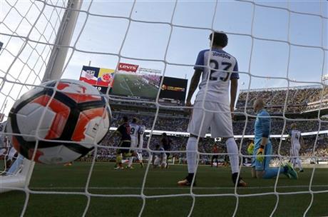 United States defender Fabian Johnson and goalkeeper Brad Guzan second from right react after Colombia defender Cristian Zapata scored a goal in the first half during a Copa America Centenario Group A soccer match at Levi's Stadium in Santa Cl