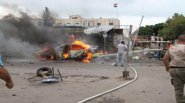 Explosions kill scores of people in Assad strongholds on Syrian coast