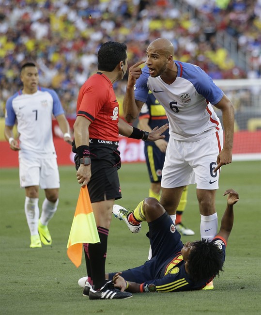 John Brooks of the United States argues with the linesman after he fouled Colombia's Juan Cuadrado during a Copa America Centenario Group A soccer match at Levi's Stadium in Santa Clara Calif. Friday