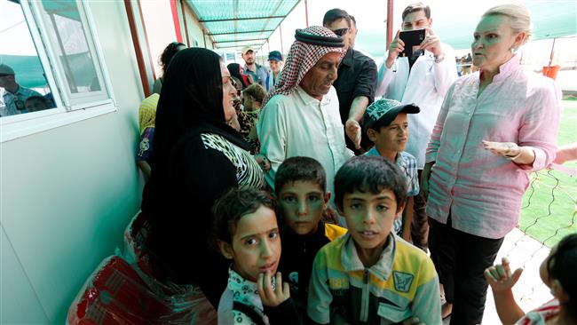 Deputy Special Representative of the United Nations Assistance Mission for Iraq Lise Grande visits a refugee camp in Amiriyah Fallujah south of Fallujah Iraq