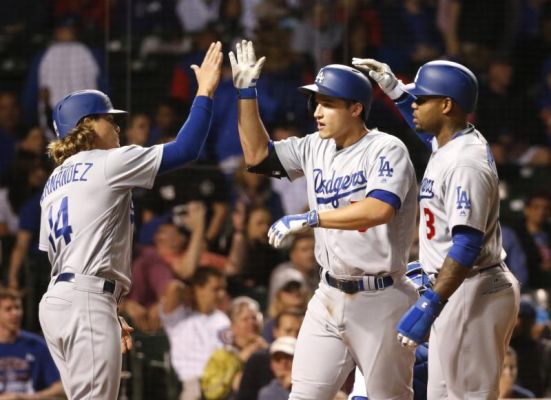 Los Angeles Dodgers Corey Seager center is greeted