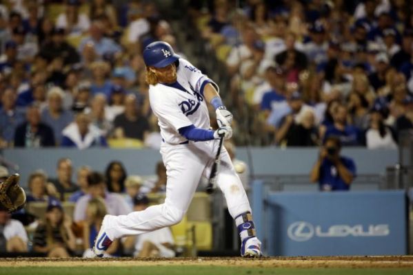 Los Angeles Dodgers Justin Turner hits a three-run