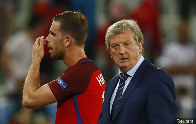 England's Jordan Henderson and England head coach Roy Hodgson at the end of the game