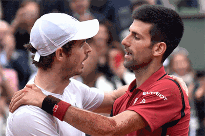 Serbia's Novak Djokovic speaks with Britain's Andy Murray at the 2016 French Open