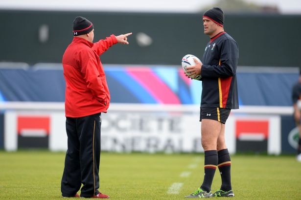 Warren Gatland and Jamie Roberts during training on Friday