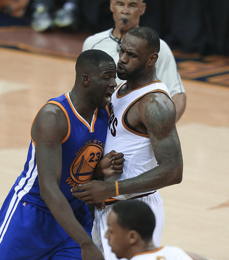 Golden State Warriors forward Draymond Green and Cleveland Cavaliers forward Le Bron James have words during the second half of Game 4 of basketball's NBA Finals in Cleveland Friday June 10. AP