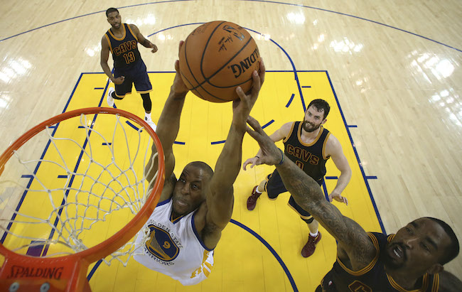 Golden State Warriors forward Andre Iguodala dunks against the Cleveland Cavaliers during the first half of Game 2 of basketball's NBA Finals in Oakland Calif. Thursday