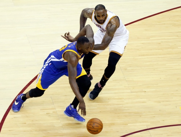 Golden State Warriors forward Draymond Green drives to the basket against Cleveland Cavaliers forward Le Bron James during Game 4 of the NBA Finals