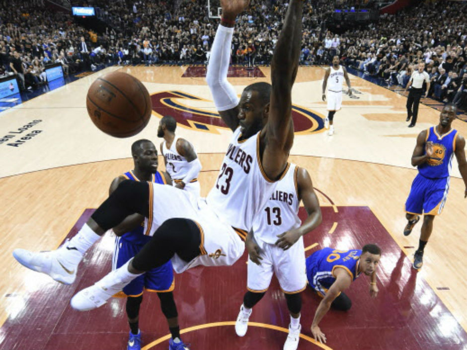 LeBron James of the Cleveland Cavaliers follows through on a dunk during Game 6 action in the NBA Finals against the Golden State Warriors Thursday night in Cleveland. James had 41 points as the Cavs posted a 115-101 victory over the Golden State Warriors