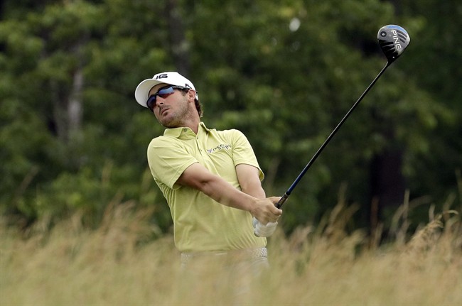 Andrew Landry watches his tee shot fourth tee during the first round of the U.S. Open golf championship at Oakmont Country Club on Thursday