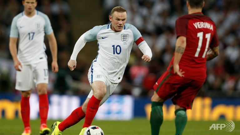 While Wayne Rooney had been expected to support Harry Kane and Jamie Vardy from a withdrawn role he operated as a central striker AFP  Adrian Dennis