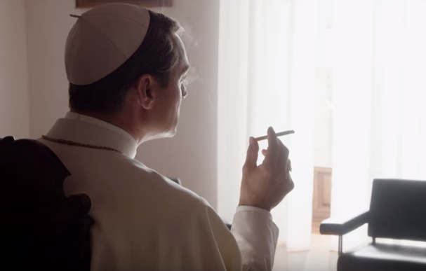 Jude Law's sexy Young Pope smokes and kneels in strange places in first trailer for new Vatican drama