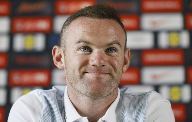 England¿s Wayne Rooney smiles during a press conference at Les Fontaines in Chantilly France Thursday